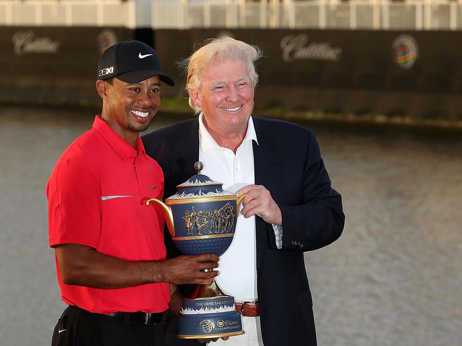 Tiger Woods with Donald Trump in 2013 after the Cadillac Championship