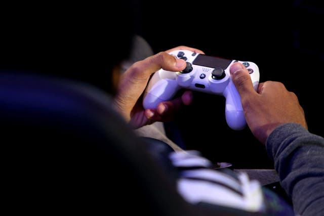 A detailed view of a PS4 controller as players practice during day one of the 2019 ePremier League Finals at Gfinity Arena on March 28, 2019 in London