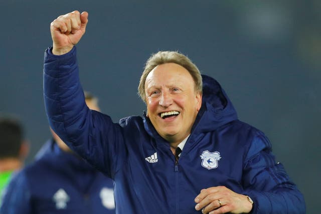 Cardiff City manager Neil Warnock celebrates after the match