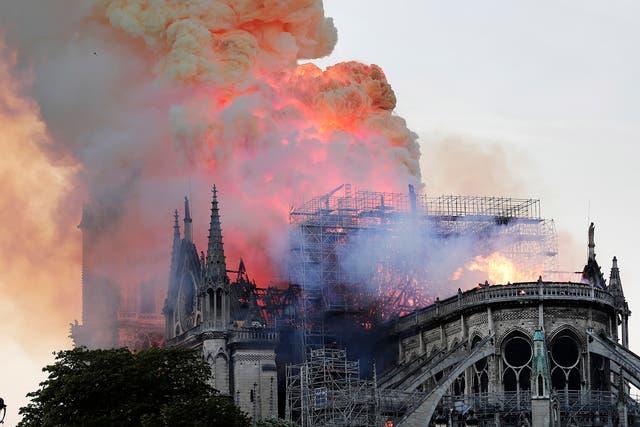 The spire on the 850 year old Gothic cathedral collapsed during the fire, destroying part of the roof.