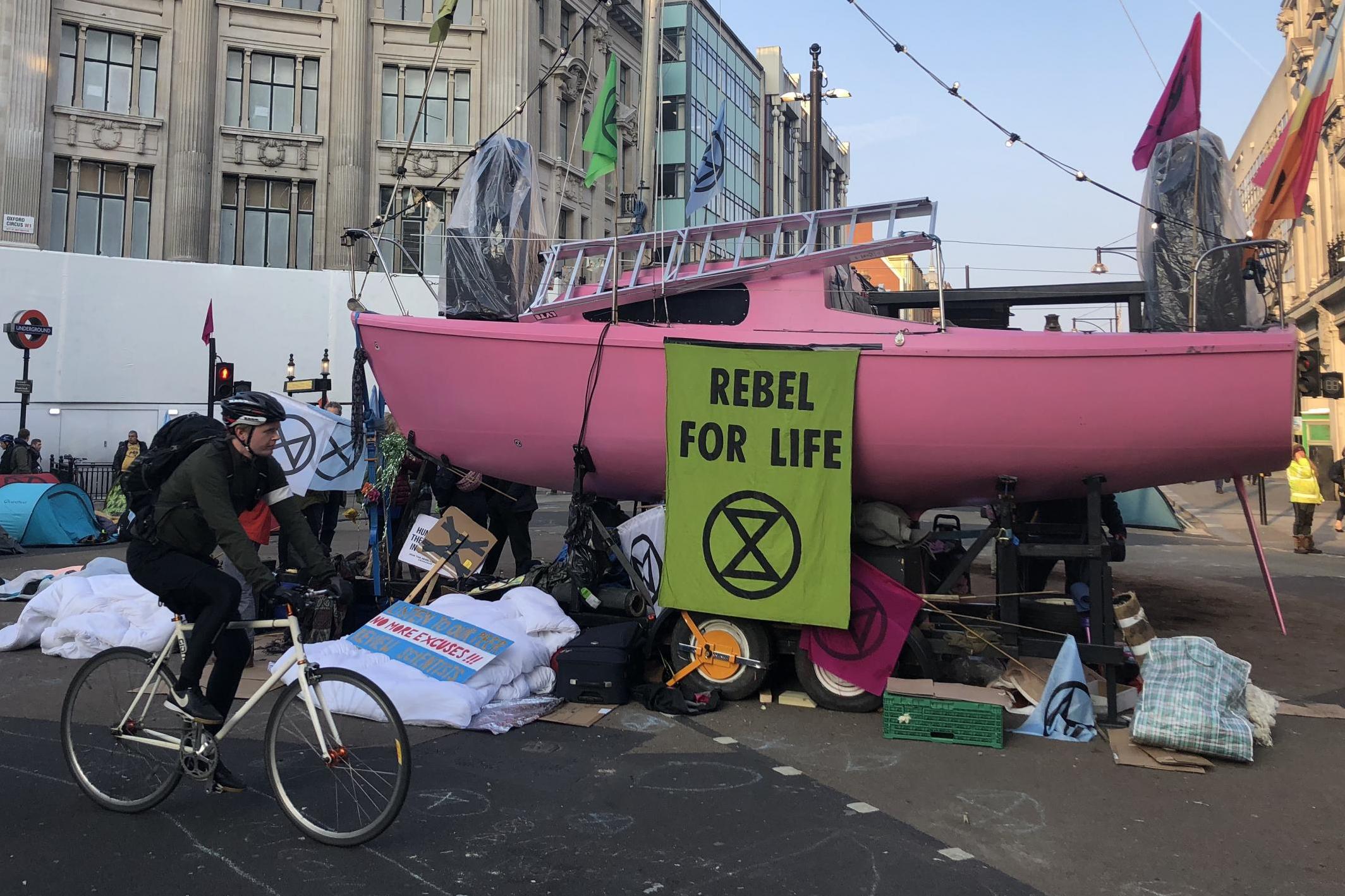 Floating voters: climate change protesters in the middle of Oxford Circus in central London