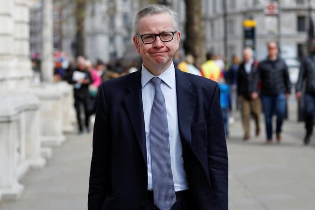 Related video: Michael Gove talks about cutting single-use plastic while using a plastic cup
