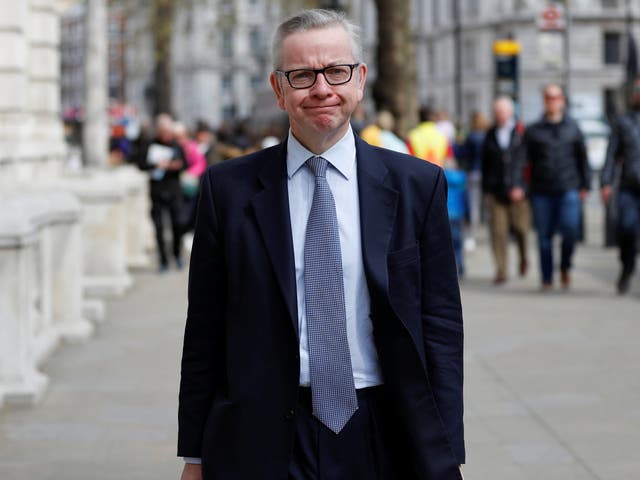 Related video: Michael Gove talks about cutting single-use plastic while using a plastic cup