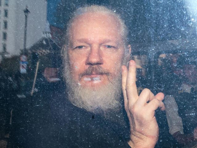 Julian Assange arrives at Westminster Magistrates court on 11 April