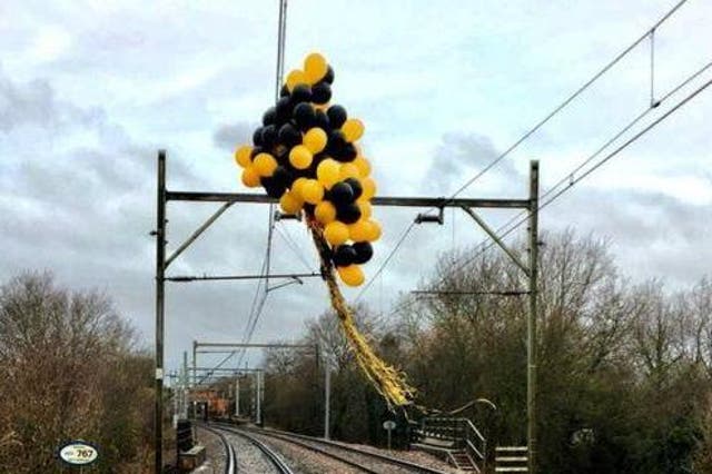 Balloons caught on high voltage railway wires