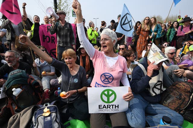 Extinction Rebellion climate change demonstrators protest on Waterloo Bridge in London 17 April 2019.