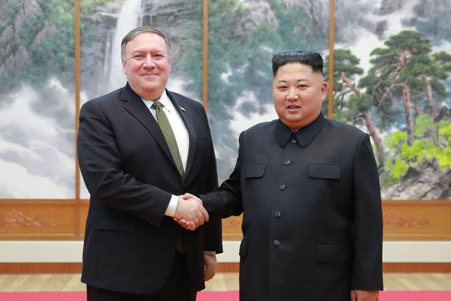 US Secretary of State Mike Pompeo shakes hands with Kim Jong-un in Pyongyang in October 2018