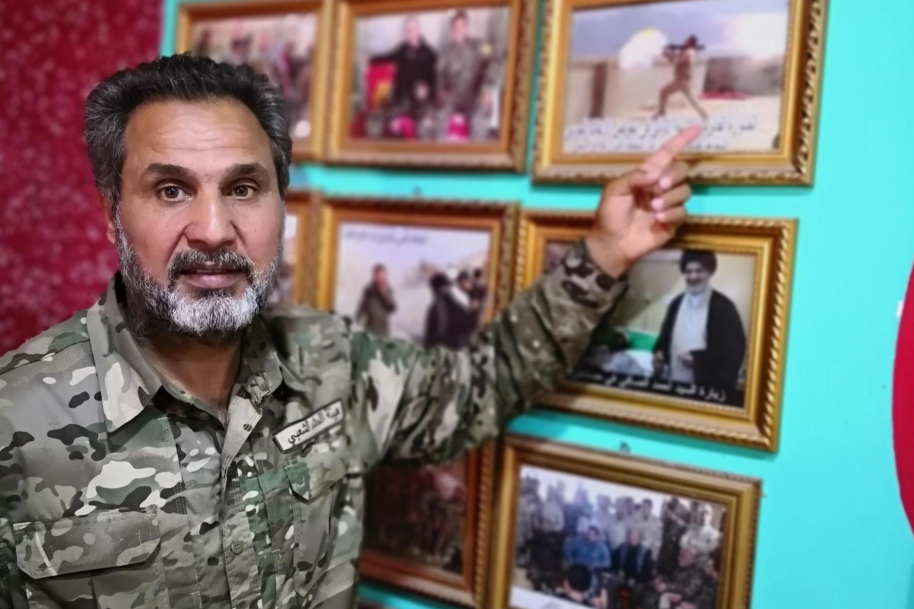 Walking wounded: veteran Tammy al-Yasaari with his war photo exhibition at home in Kerbala
