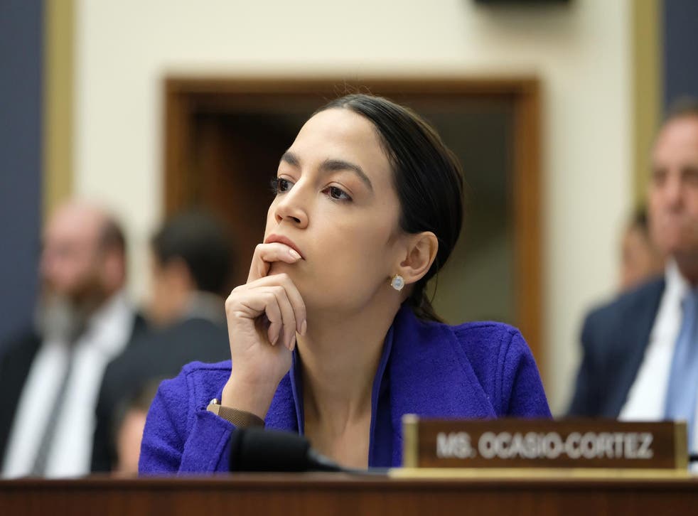 Rep. Alexandria Ocasio-Cortez (D-NY) listens during a House Financial Services Committee hearing  on April 10, 2019 in Washington, DC