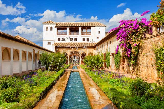 Alhambra Palace is surrounded by the Sierra Nevada mountains, and was primarily constructed over the reigns of three different Spanish Moors between the 13th and 14 century