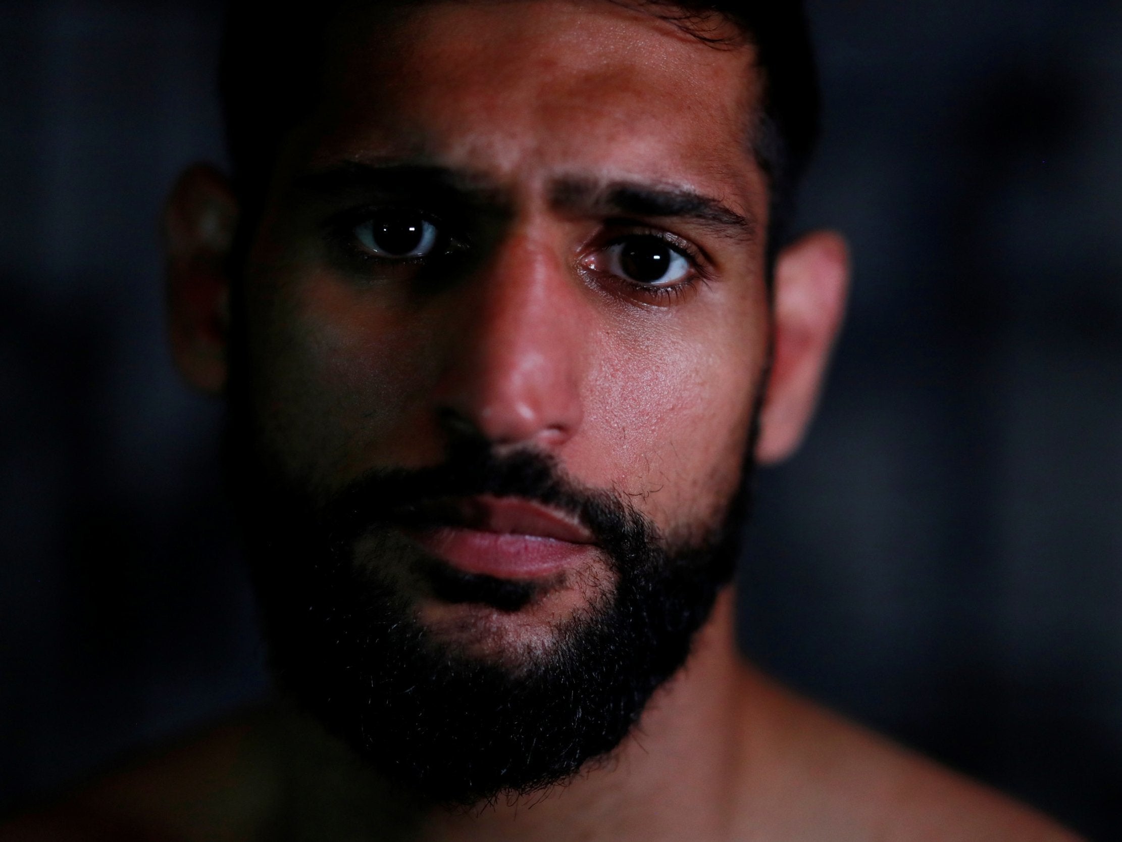 Amir Khan poses for a photo during the work-out
