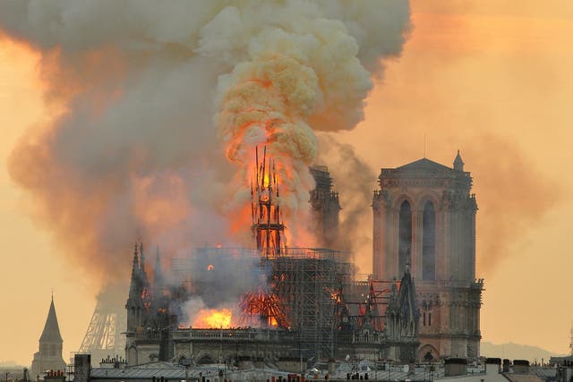 Flames and smoke rise from Notre Dame on 15 April