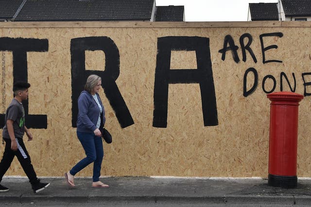 An altered dissident republican mural in Derry that was changed after violence that saw a journalist shot dead on 18 April