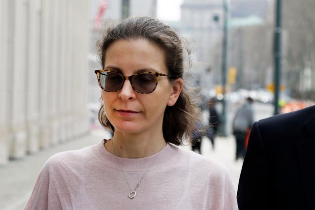  Seagram’s alcohol heiress Clare Bronfman jailed for more than six years for her role in the Nxivm sex cult.