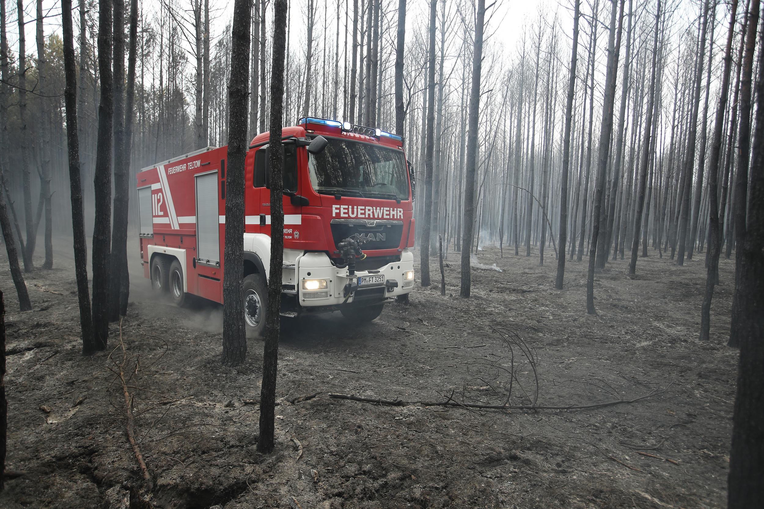 "This was only one of several large-scale forest fires in Brandenburg state in Germany last year, following droughts which left the forests in the region extremely dry. The year set a new record for fires that burned over 400 hectares. As a photojournalist covering the region for over 15 years, I now have to assume either drought or floods will very likely be a part of the news we will be covering every summer" - Sean Gallup