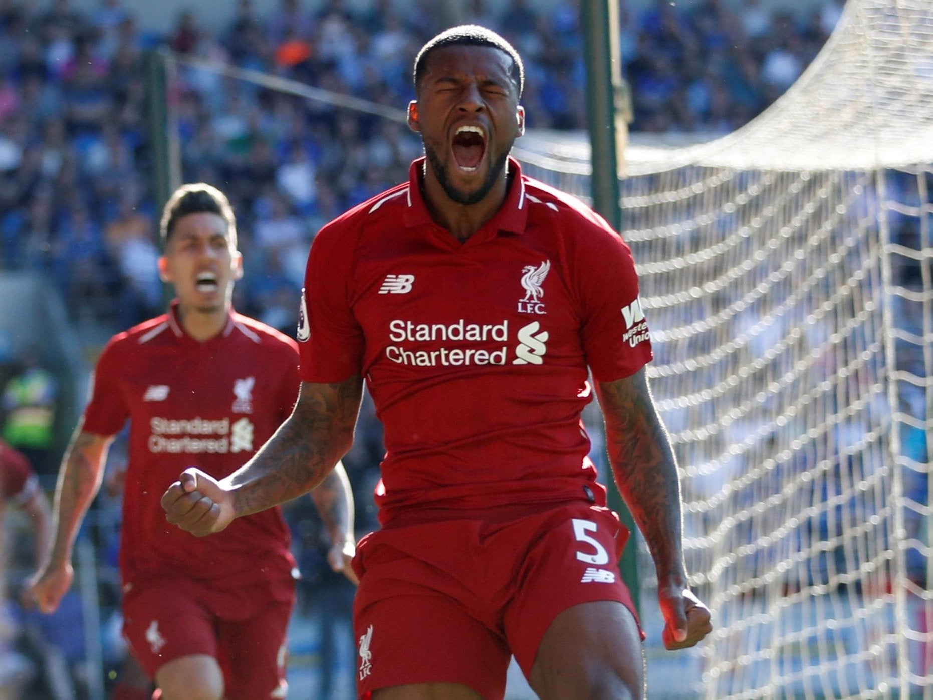 Georginio Wijnaldum celebrates putting Liverpool in front of Cardiff