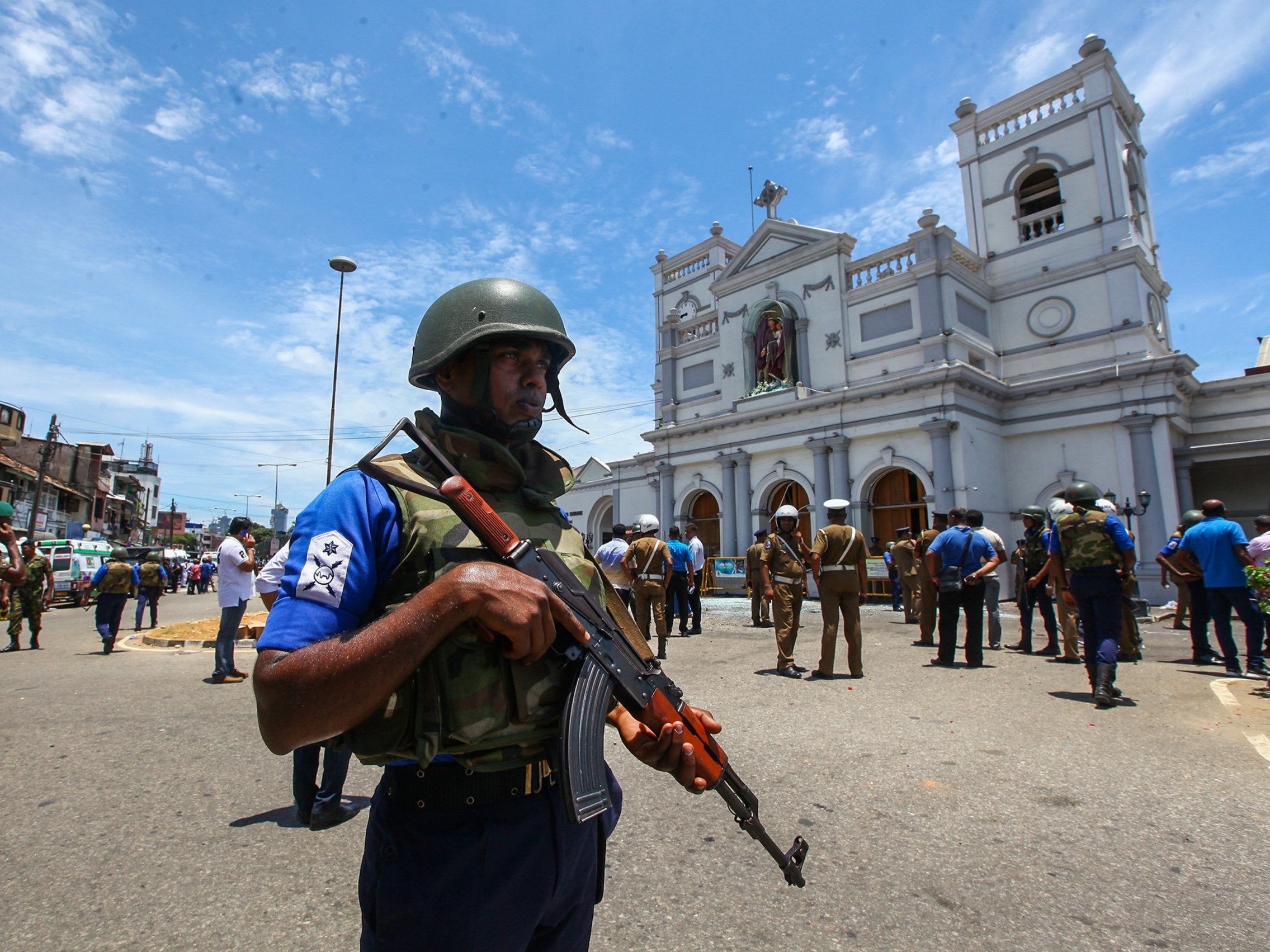 A security officer stands guard after Sunday’s atrocities in Colombo