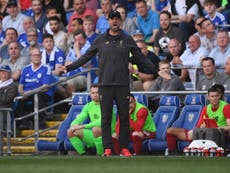 Klopp critical of Cardiff pitch after Liverpool reclaim top spot