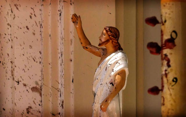 Blood stains the walls of St Sebastian's Church after a blast in Negombo, north of Colombo