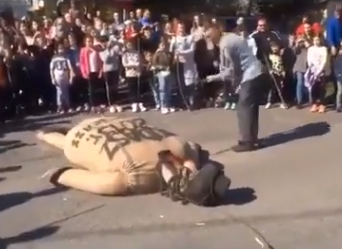 Hundreds of residents, including children, were said to have taken part, reportedly beating and burning the effigy representing Judas