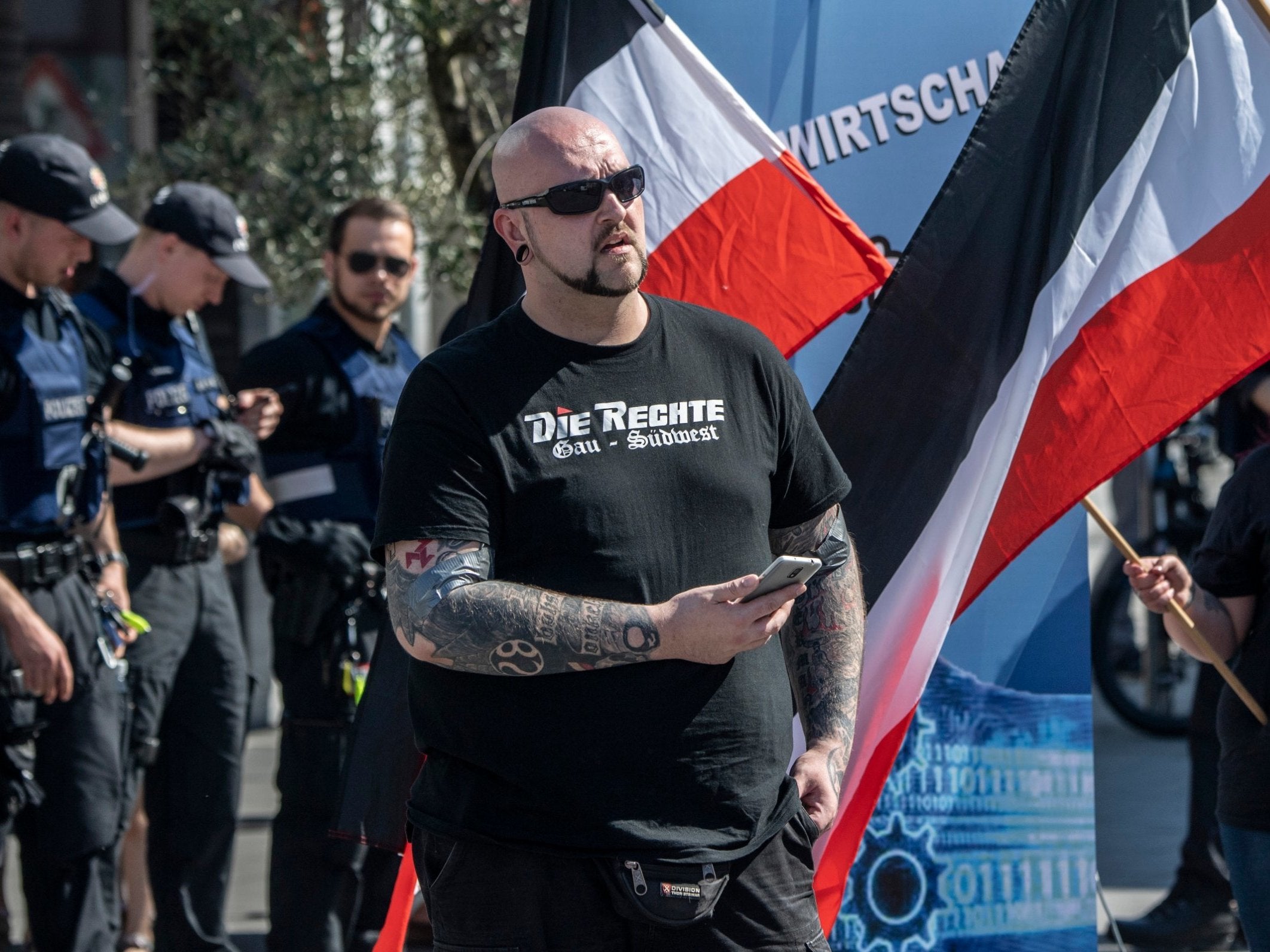 A man participates in a demonstration in Ingelheim, Germany
