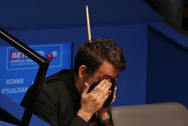 Ronnie O'Sullivan must overturn a 5-4 deficit to avoid a first-round elimination at the World Snooker Championship