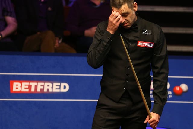 Ronnie O'Sullivan suffered an upset first-round defeat at the World Championship against amateur James Cahill