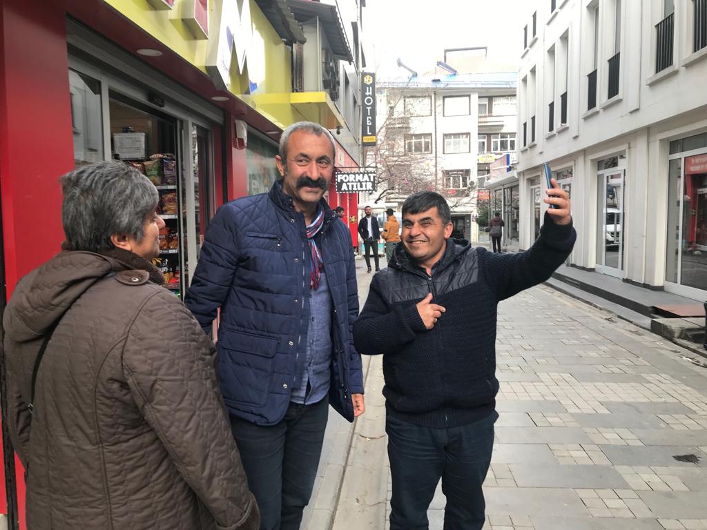 Macoglu?(centre) meets constituents on the streets of Tunceli