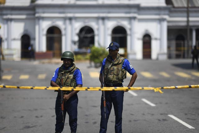 Security personnel stand guard near St Anthony's Shrine in Colombo on April 24