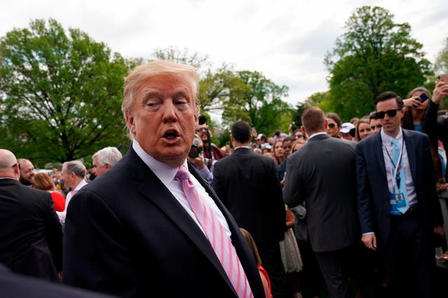 US president Donald Trump speaks to reporters during the annual White House Easter Egg Roll on the South Lawn of the White House in Washington, DC, on 22 April 2019