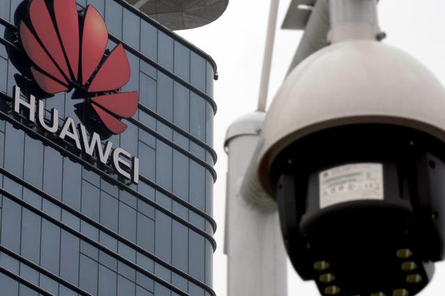 A surveillance camera is seen in front of the Huawei factory in Dongguan, Guangdong province, China