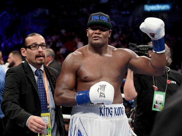 Luis Ortiz celebrates a 10th round knockout win over Travis Kauffman