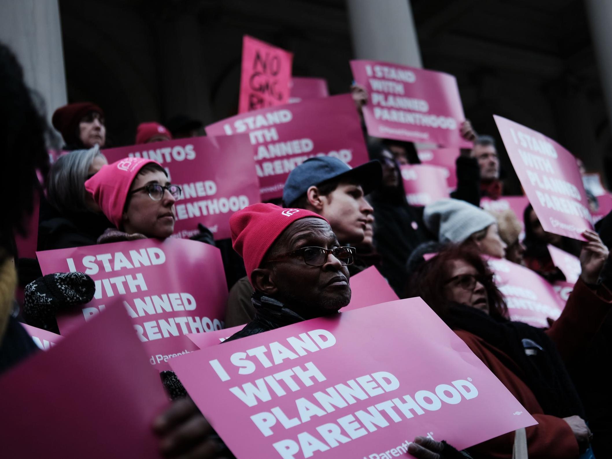 Pro-choice activists, politicians and others associated with Planned Parenthood gather against the Trump administration's title X rule change in February in New York City