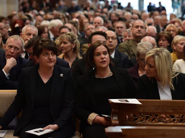 Arlene Foster, leader of the DUP, Mary Lou McDonald, Leader of Sinn Fein and Michelle O'Neill, Vice President of Sinn Fein attend the funeral service of journalist Lyra McKee