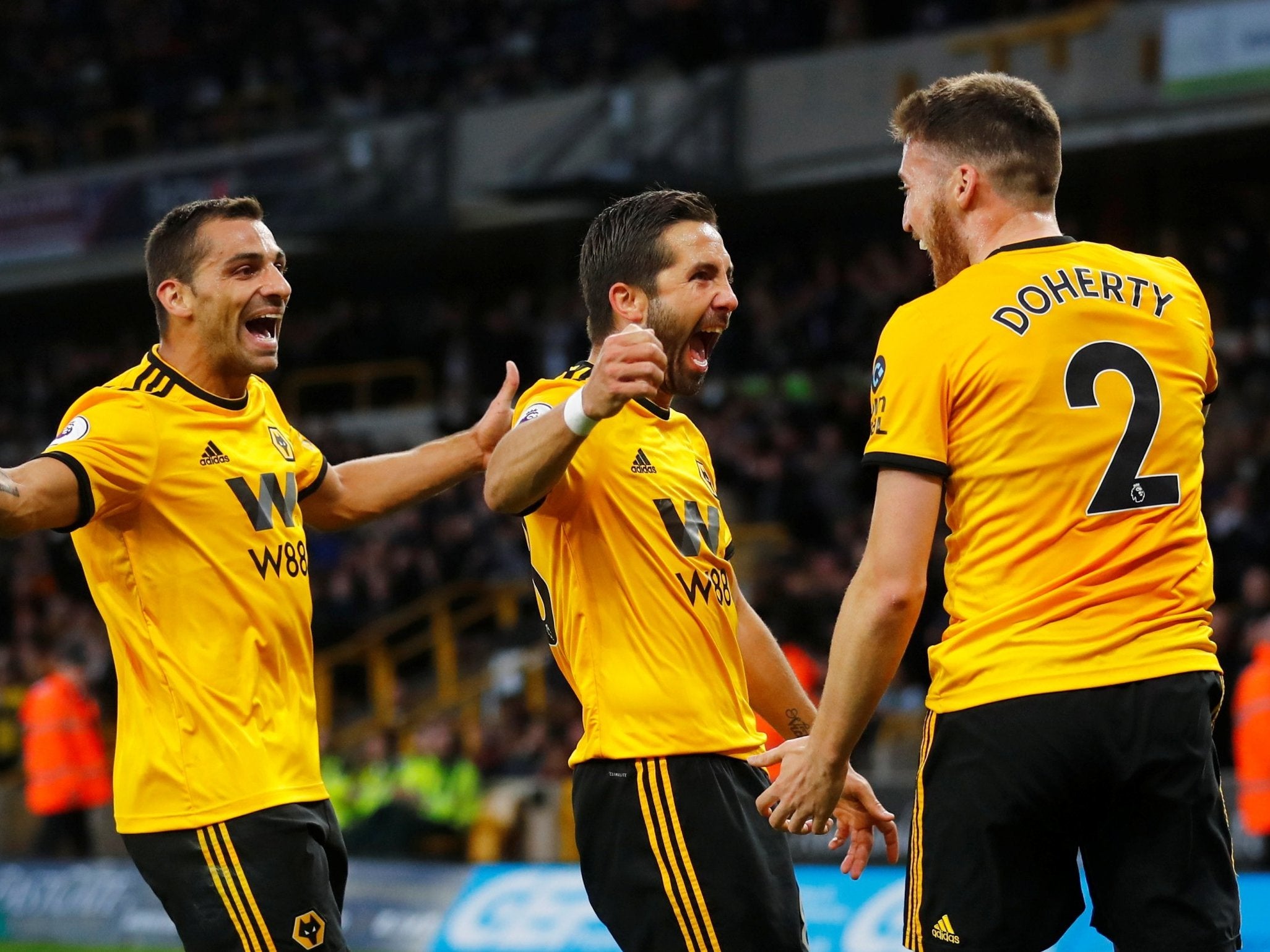 Wolves celebrate their third goal of the game