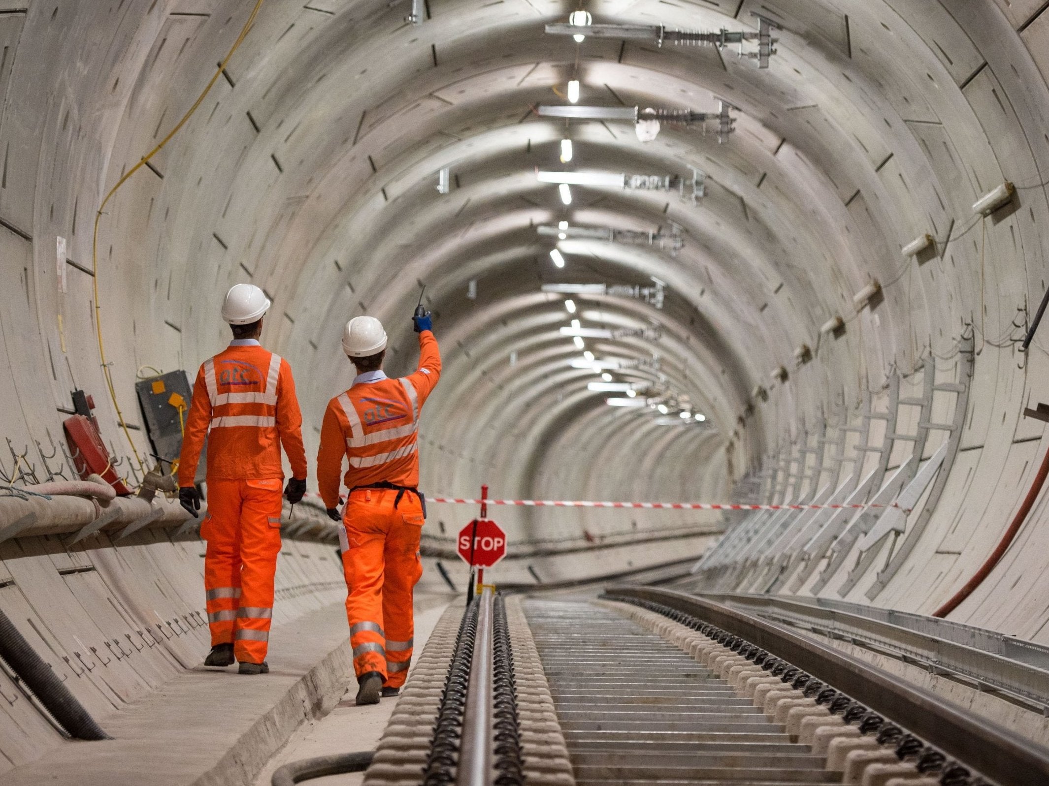 Crossrail engineers inspecting completed tracks in 2018