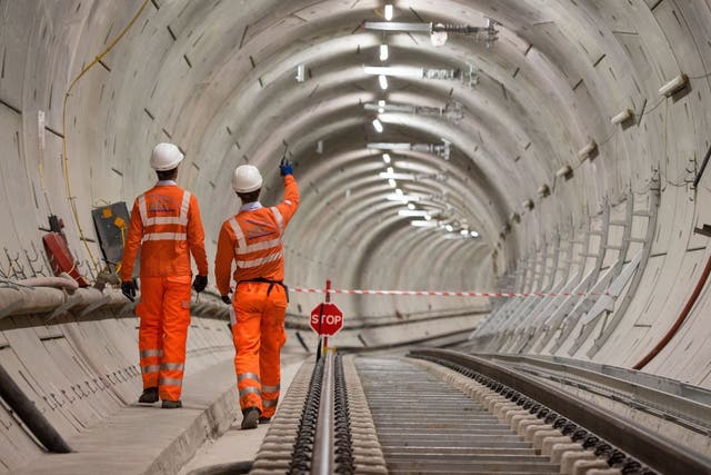 Crossrail engineers inspecting completed tracks in 2018