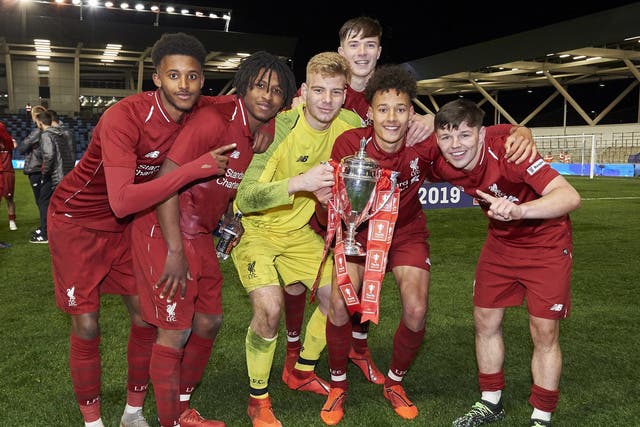Members of Liverpool's Under-18s celebrate beating Manchester City to win the FA Youth Cup final