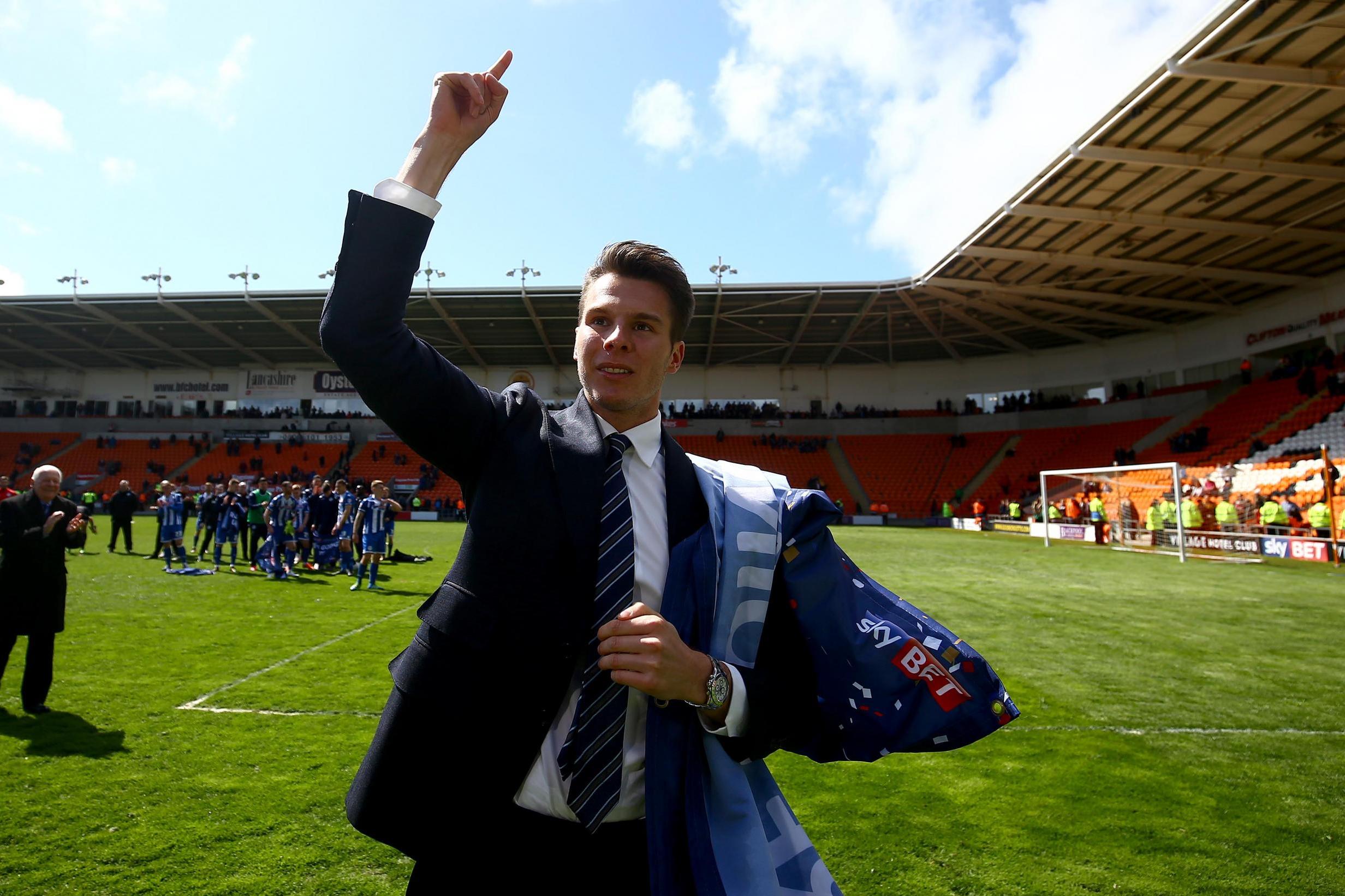 Sharpe celebrates Wigan's promotion from League One