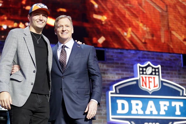 NFL commissioner Roger Goodell (right, with player Drew Lock at last year's draft) will be greeted by virtual boos this year