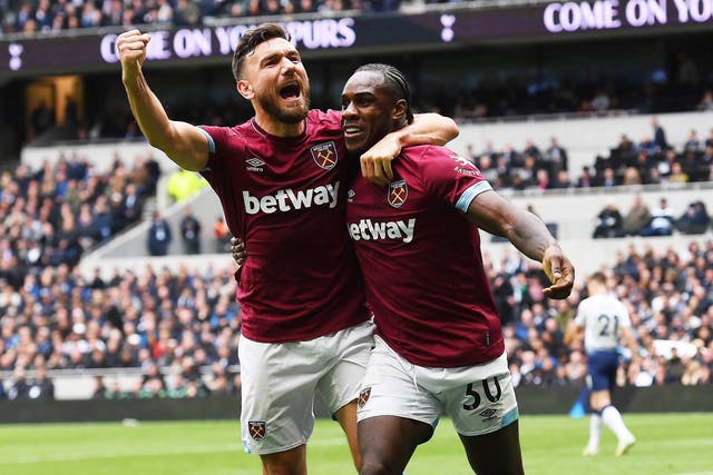 West Ham inflicted a first defeat on Tottenham at their new stadium after Michail Antonio's goal