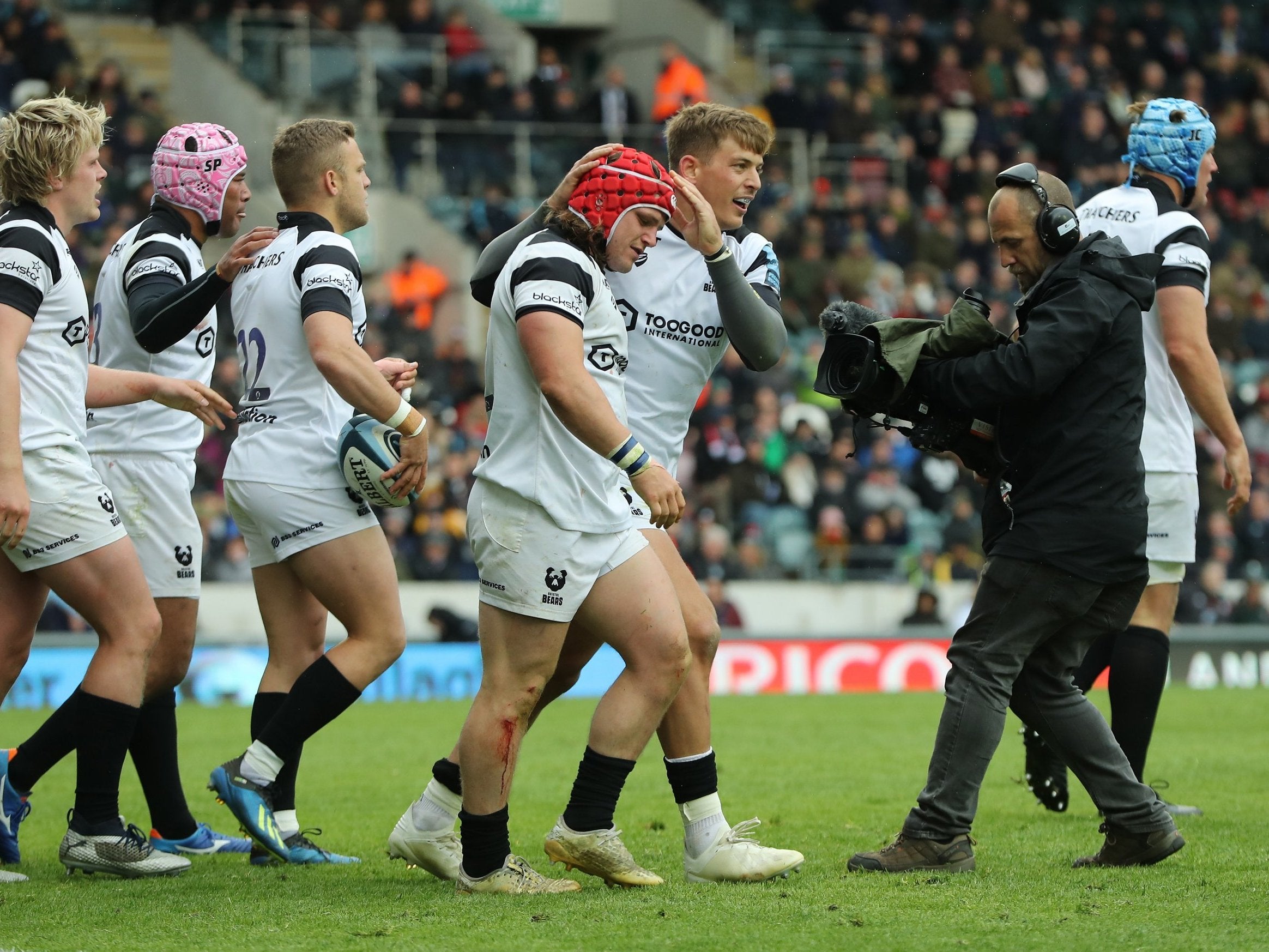 Harry Thacker celebrates scoring a try for Bristol against former side Leicester