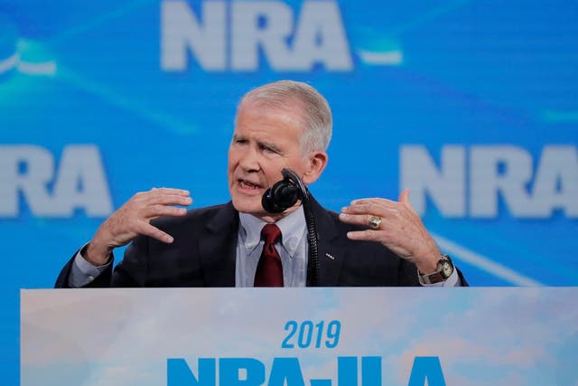 Oliver North addresses the NRA's annual meeting earlier this week