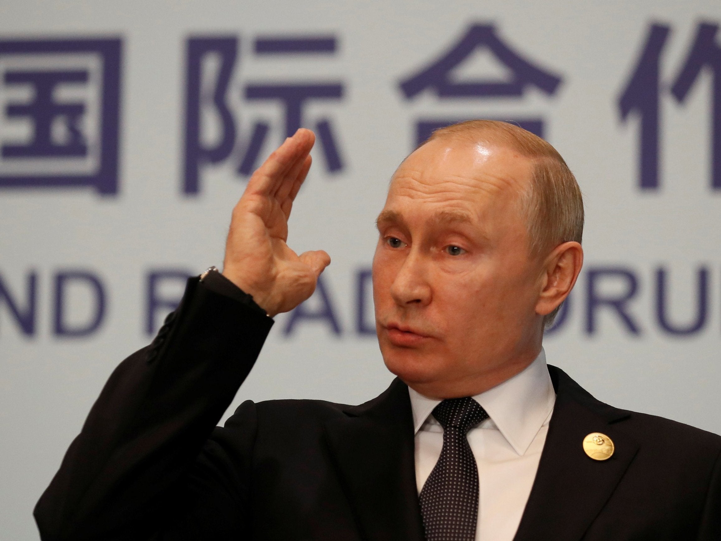 Vladimir Putin speaking at a news conference in Beijing, China, 27 April