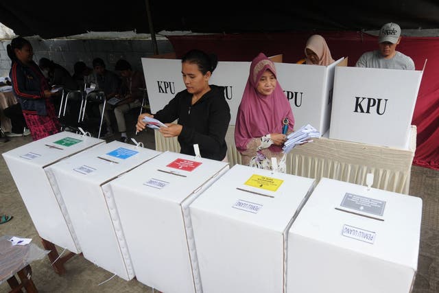 Indonesian voters cast their ballots