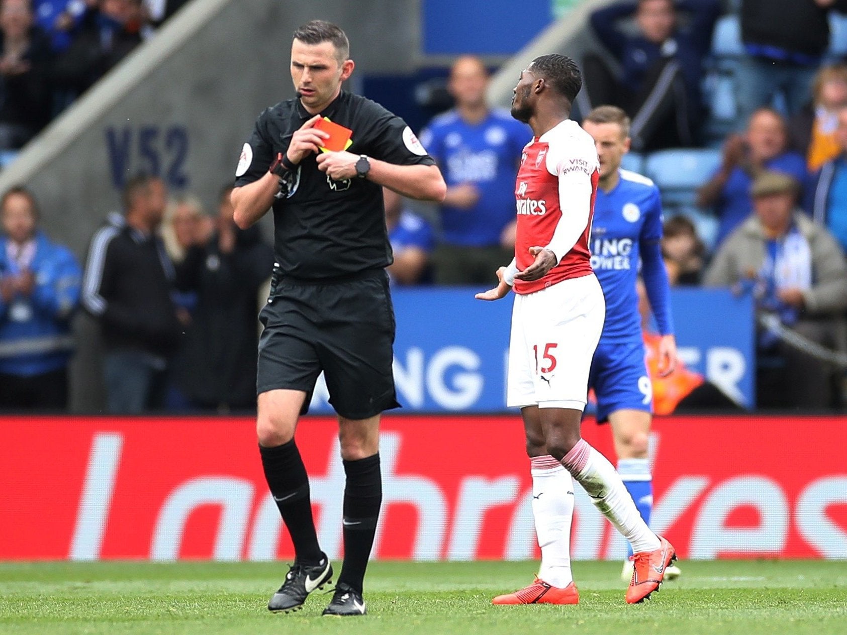 Ainsley Maitland-Niles reacts after being sent off