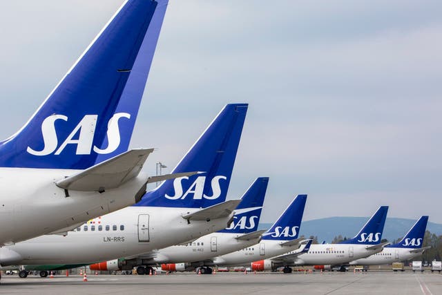 SAS planes are seen grounded at Oslo Gardermoen airport during pilots strikes on 26 April