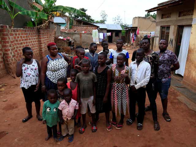 Mariam Nabatanzi with some of her 38 children at their home in Kasawo village, Uganda