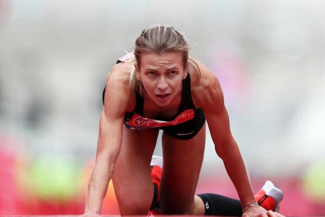 Hayley Carruthers crawls to the London Marathon finish line