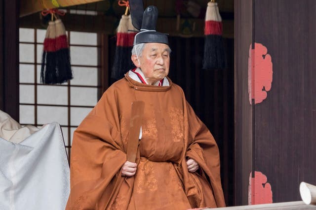 Japan's Emperor Akihito walks for a ritual called Taiirei-Tojitsu-Kashikodokoro-Omae-no-gi, a ceremony for the Emperor to report the conduct of the abdication ceremony, at the Imperial Palace in Tokyo, Japan, 30 April 2019.
